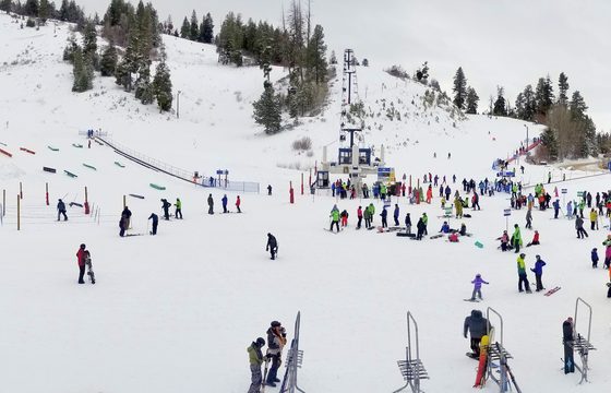 Skiers on the open slope at Bogus Basin, sixteen miles above Boise