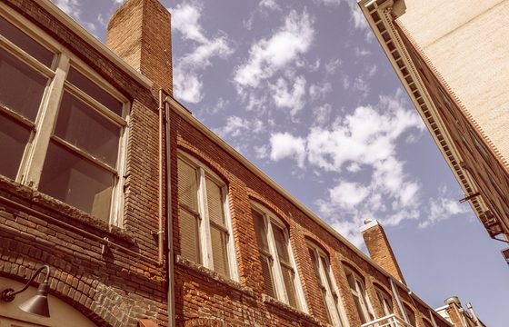 Brick commercial buildings in downtown Boise seen from street level