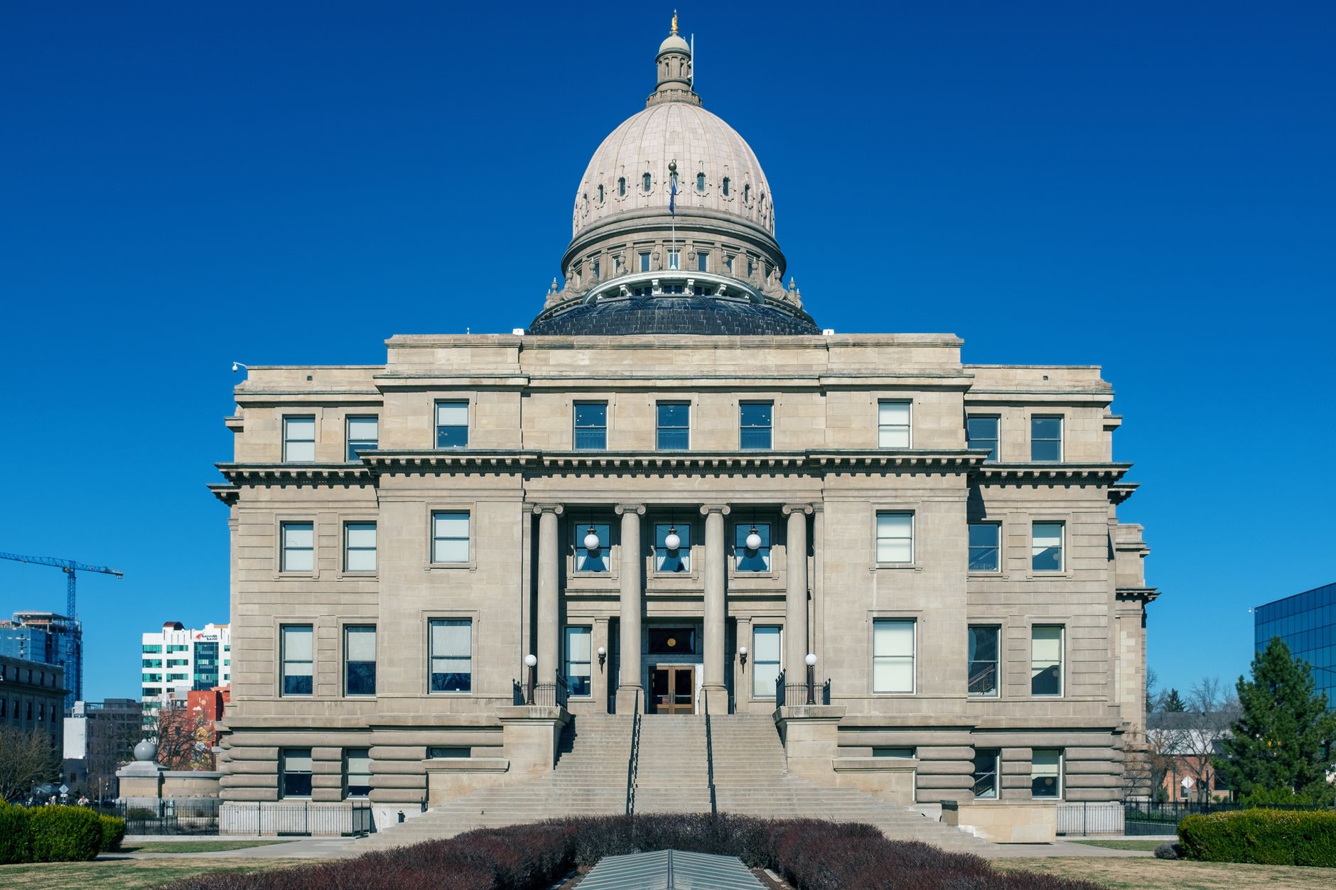 Front view of the historic Idaho State Capitol Building under blue skies in Boise, illustrating What Should You Know About Wildfire Season Near Boise