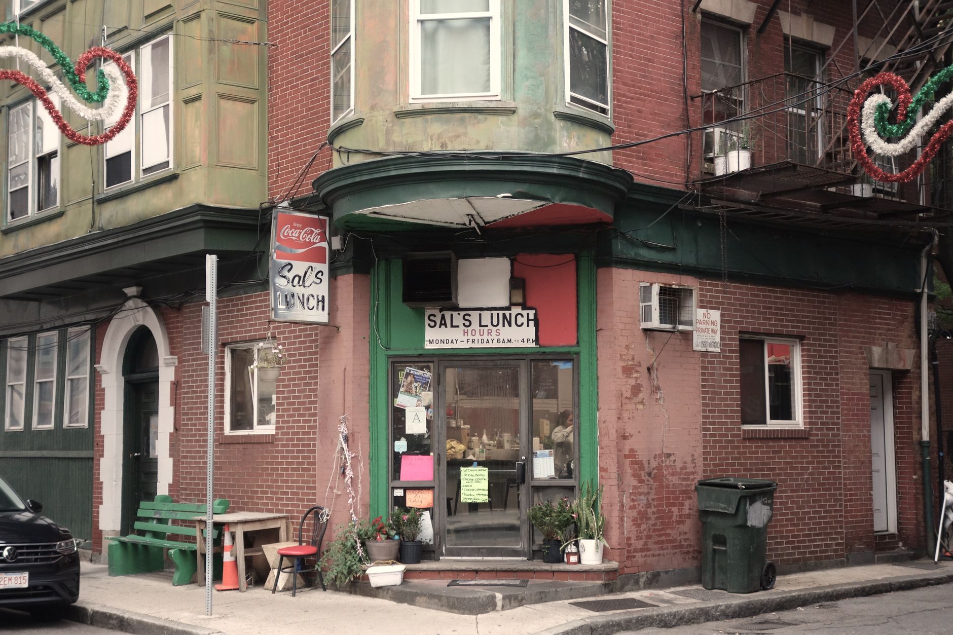 A vintage diner facade on a street corner in Boston's historic North End, illustrating What Is Boise's North End, and Why Does It Look Like That